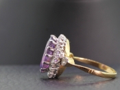 STUNNING AMETHYST AND DIAMOND 18 CARAT GOLD CLUSTER RING