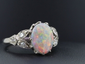 STUNNING OPAL AND DIAMOND PLATINUM RING