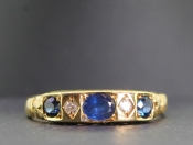 SOPHISTICATED SAPPHIRE AND DIAMOND 18 CARAT RING