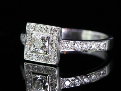 Elegant Diamond 18 Carat Gold Halo Ring