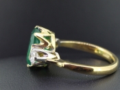 BREATHTAKING COLOMBIAN EMERALD AND DIAMOND TRILOGY 18 CARAT GOLD RING