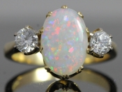 FABULOUS OPAL AND DIAMOND TRILOGY 18 CARAT GOLD RING