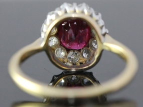 EXQUISITE RUBY AND DIAMOND 18 CARAT GOLD CLUSTER RING