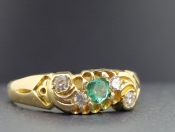 FABULOUS EMERALD AND DIAMOND 18 CARAT GOLD BAND WITH CHESTER HALLMARK