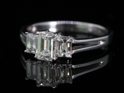 Glamorous Emerald Cut Diamond Trilogy Platinum Ring 