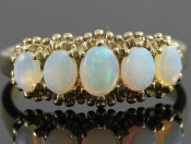 LOVLEY VINTAGE INSPIRED 9 CARAT 5 STONE OPAL RING