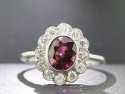 STUNNING ALMANDINE GARNET AND DIAMOND PLATINUM CLUSTER RING