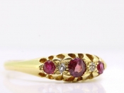 LOVELY RUBY AND DIAMOND 18 CARAT GOLD FIVE STONE RING