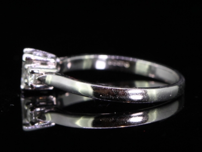 Beautiful Emerald Cut Diamond Platinum Trilogy Ring