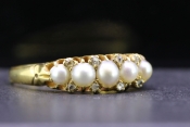  A WONDERFUL VICTORIAN PEARL AND DIAMOND 18 CARAT GOLD RING