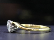 PRETTY TWO STONE DIAMOND 18 CARAT GOLD CROSSOVER RING