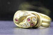 GORGEOUS DOUBLE SNAKE RUBY AND DIAMOND 18 CARAT GOLD RING