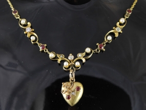 STUNNING EDWARDIAN RUBY, DIAMOND, AND PEARL HEART NECKLACE/PENDANT IN 15 CARAT GOLD