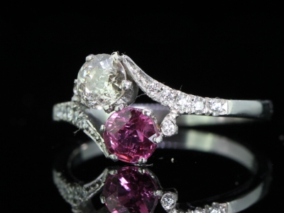 Elegant Ruby and Diamond on a Twist Platinum Ring