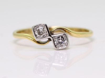 Edwardian Cross Over Diamond Platinum and 18ct Gold Ring