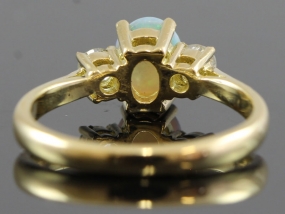 BEAUTIFUL OPAL AND DIAMOND TRILOGY 18 CARAT GOLD RING