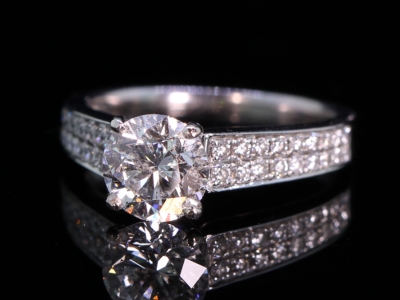 Diamond Solitaire With Diamond Shoulders 18ct Gold Ring