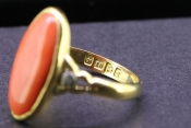 STRIKING OVAL NATURAL CORAL AND DIAMOND 18 CARAT GOLD RING