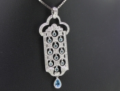 STUNNING AQUAMARINE AND DIAMOND 18 CARAT GOLD PENDANT AND CHAIN