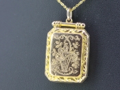  GORGEOUS RECTANGULAR 9 CARAT GOLD LOCKET