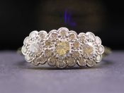 ROMANTIC TRIPLE DIAMOND DIASY 18 CARAT GOLD RING