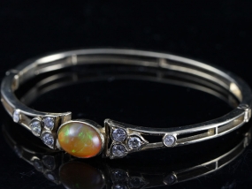 EXCEPTIONAL OPAL AND DIAMOND 9 CARAT GOLD BANGLE