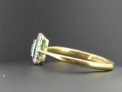 ROMANTIC ART DECO DIAMOND AND EMERALD CLUSTER 18 CARAT GOLD RING