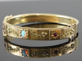 FABULOUS VICTORIAN OPAL AND RUBY SET 9 CARAT GOLD BANGLE