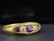 GORGEOUS RUBY AND DIAMOND 18 CARAT GOLD GYPSY RING