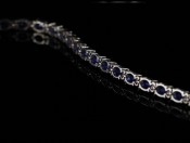 STUNNING SAPPHIRE AND DIAMOND 9 CARAT GOLD BRACELET