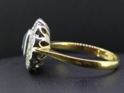 STRIKING CEYLON SAPPHIRE AND DIAMOND 18 CARAT GOLD CLUSTER RING
