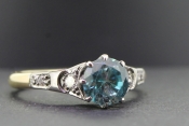 STUNNING BLUE ZIRCON AND DIAMOND 18 CARAT GOLD RING