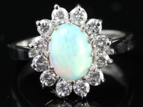 BREATH TAKING AUSTRALIAN OPAL AND DIAMOND 18 CARAT GOLD CLUSTER RING