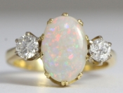 FABULOUS OPAL AND DIAMOND TRILOGY 18 CARAT GOLD RING