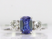 STUNNING CEYLON SAPPHIRE AND DIAMOND 18 CARAT GOLD TRILOGY RING