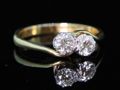 Elegant Two Stone Diamond Twist 18ct Gold Ring