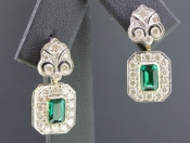  ENTRANCING EMERALD AND DIAMOND 18 CARAT GOLD EARRINGS