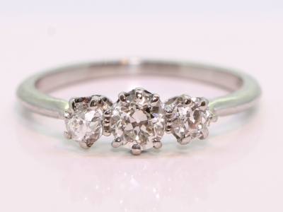 Art Deco Old mined Hand Cut Diamond Trilogy Platinum Ring