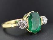 BREATHTAKING COLOMBIAN EMERALD AND DIAMOND TRILOGY 18 CARAT GOLD RING