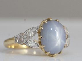 STUNNING STAR SAPPHIRE AND DIAMOND ART DECO INSPIRED 18 CARAT GOLD COCKTAIL RING