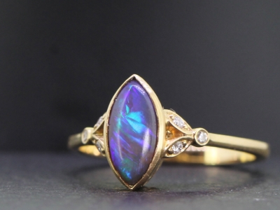 STUNNING SOLID BLACK OPAL AND DIAMOND 14 CARAT RING