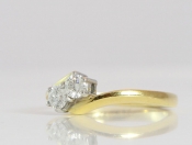 GORGEOUS TWO STONE DIAMOND ON A TWIST IN 18 CARAT GOLD