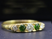  TANTALISING DEMANTOID GARNET AND DIAMOND 18 CARAT GOLD RING