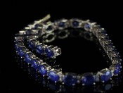 STUNNING SAPPHIRE AND DIAMOND 9 CARAT GOLD BRACELET