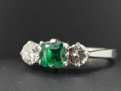STUNNING COLOMBIAN EMERALD AND DIAMOND PLATINUM TRILOGY RING