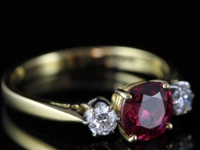 STUNNING NATURAL UNHEATED BURMESE RUBY AND DIAMOND 18 CARAT GOLD TRILOGY RING