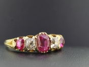 VIVACIOUS RUBY AND DIAMOND FIVE STONE 18 CARAT GOLD RING