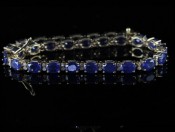 STUNNING SAPPHIRE AND DIAMOND 9 CARAT GOLD BRACELET