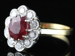 SENSATIONAL RUBY AND DIAMOND CLUSTER 18 CARAT GOLD RING