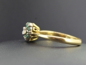 PRETTY EMERALD AND DIAMOND 18 CARAT GOLD RING
